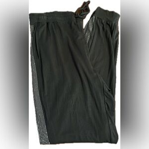 Woman’s Jeans by Buffalo stretch waist tie silver studs sides size XL/XG